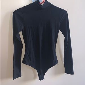 Black turtleneck bodysuit